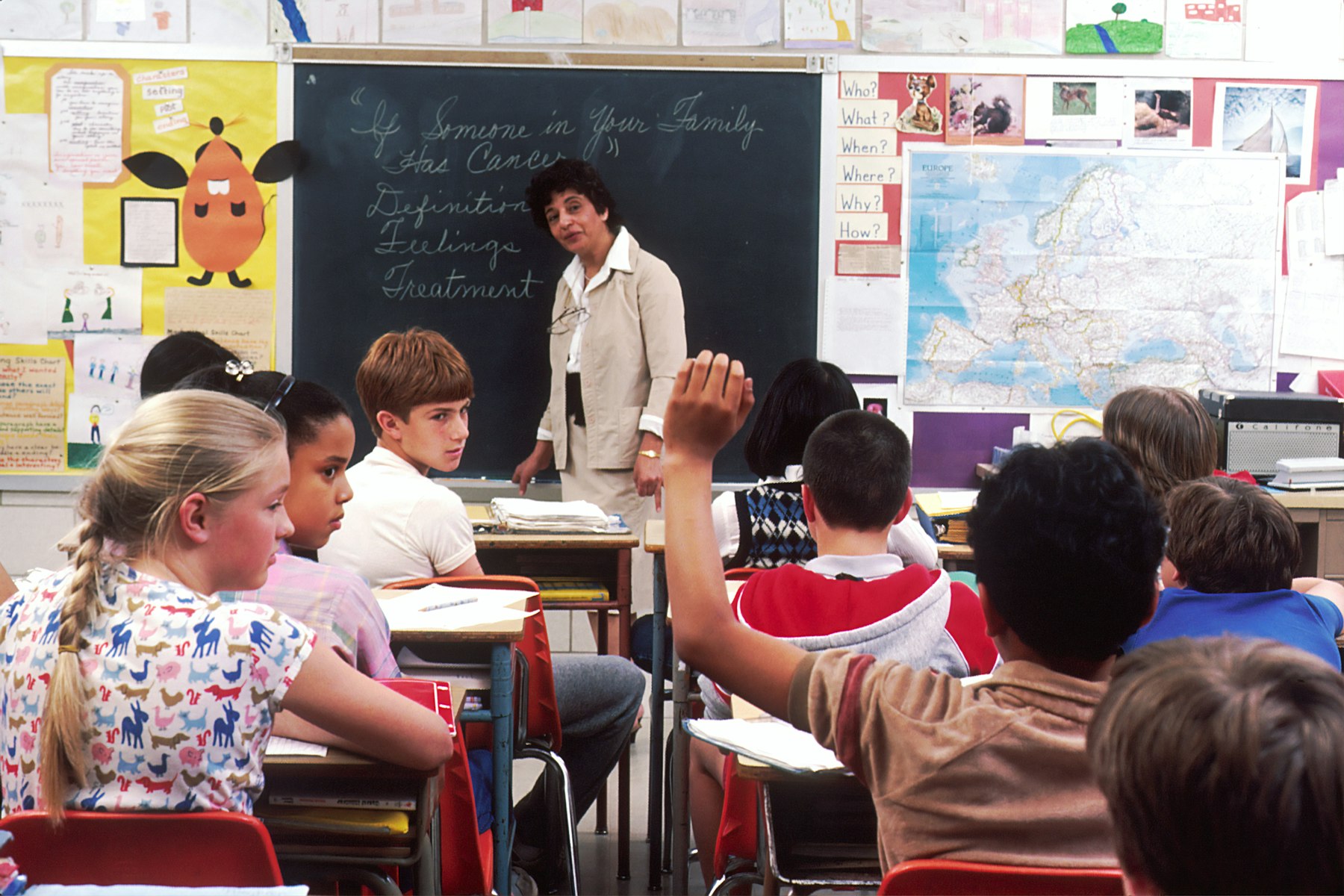 Teacher leading a classroom of students