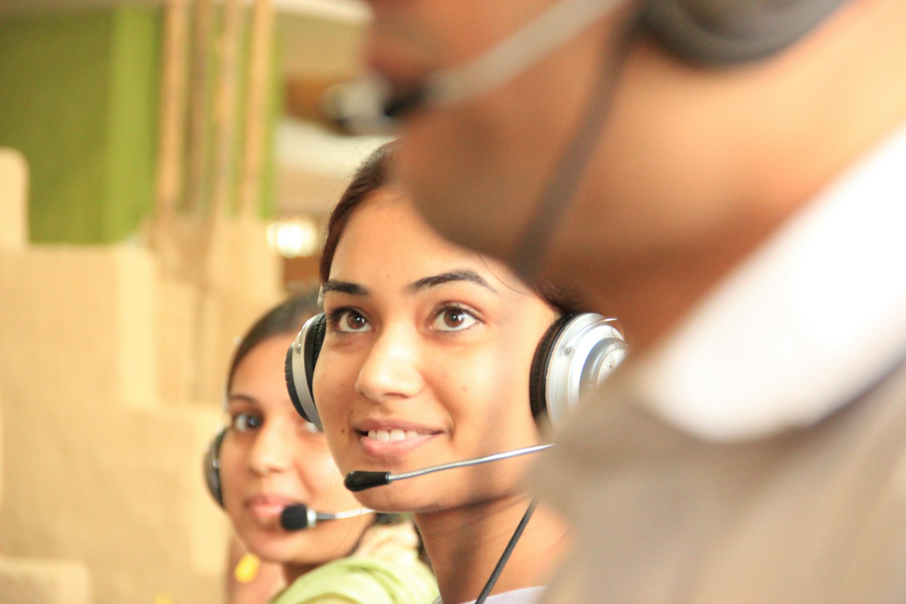 Customer service team member wearing a headset